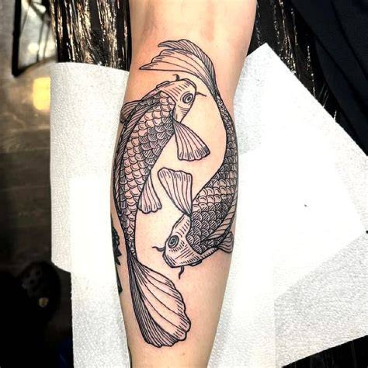 Discover the Meaning and Significance of Black Koi Tattoos